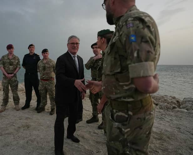 Prime Minister Sir Keir Starmer meets military personnel on a beach in Bahrain during a visit to the Gulf region last month (Picture: Alastair Grant/PA Wire)