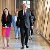 John Swinney with Kate Forbes as they arrive for his debut at First Minister's Questions at Holyrood