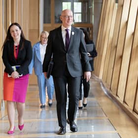 John Swinney with Kate Forbes as they arrive for his debut at First Minister's Questions at Holyrood