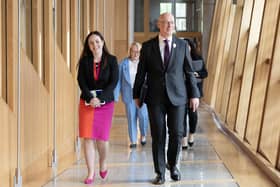 John Swinney with Kate Forbes as they arrive for his debut at First Minister's Questions at Holyrood