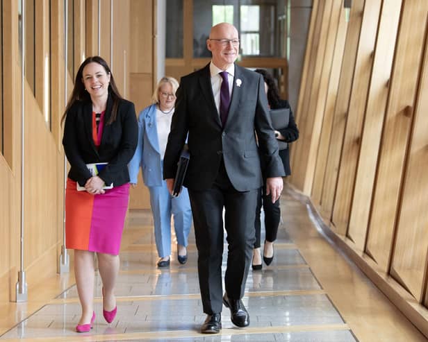 John Swinney with Kate Forbes as they arrive for his debut at First Minister's Questions at Holyrood