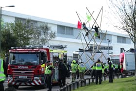 Police and fire services outside the Newsprinters printing works at Broxbourne, Hertfordshire, protesters used bamboo lock-ons and vans to block the road.