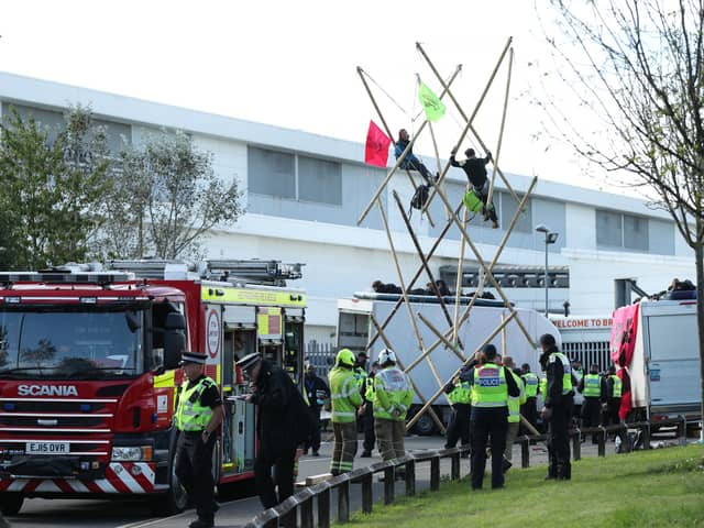 Police and fire services outside the Newsprinters printing works at Broxbourne, Hertfordshire, protesters used bamboo lock-ons and vans to block the road.