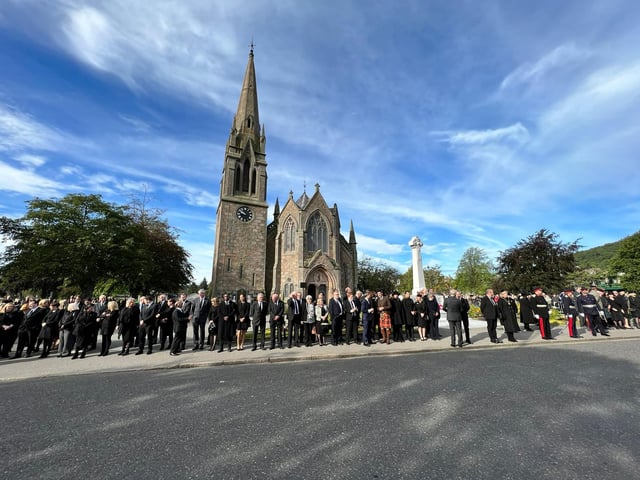 Crowds begin to line the streets in Ballater ahead of the Queen's coffin beginning its journey from Balmoral (Pic: Michael Gillen)