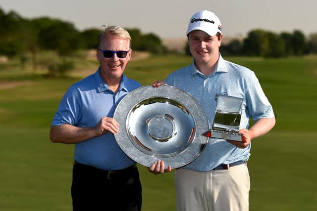 Keith Pelley presented Bob MacIntyre with with the 2019 Sir Henry Cotton Rookie of the Year and Challenge Tour Graduate of the Year awards following the DP World Tour Championship at Jumeirah Golf Estates in Dubai. Picture: Tom Dulat/Getty Images.