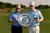 Keith Pelley presented Bob MacIntyre with with the 2019 Sir Henry Cotton Rookie of the Year and Challenge Tour Graduate of the Year awards following the DP World Tour Championship at Jumeirah Golf Estates in Dubai. Picture: Tom Dulat/Getty Images.