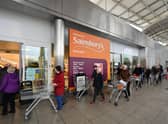 Shoppers queue outside a Sainsbury's supermarket during the early stages of last spring's lockdown. Picture: Dan Mullan/Getty Images