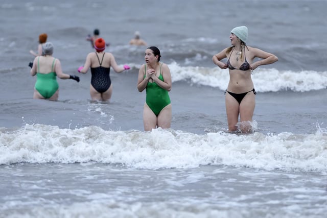 Swimmers take part in a sunrise dip at Portobello Beach, to mark International Women’s Day. Photo by Jeff J Mitchell/Getty Images