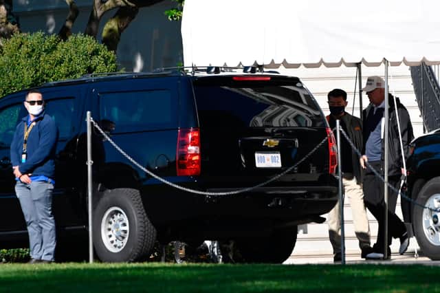 US president Donald Trump (R) walks to the motorcade on the South Lawn of the White House in Washington, DC, on November 7, 2020, as he departs for an undisclosed location. (Photo by ANDREW CABALLERO-REYNOLDS / AFP) (Photo by ANDREW CABALLERO-REYNOLDS/AFP via Getty Images)