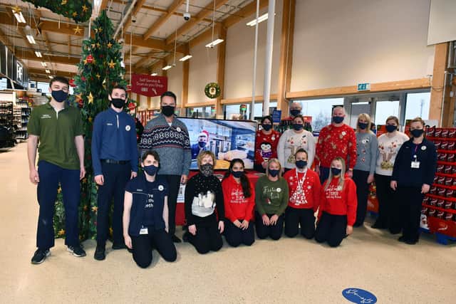 Staff from Tesco Redding in Falkirk have produced a video sending Christmas wishes to customers.