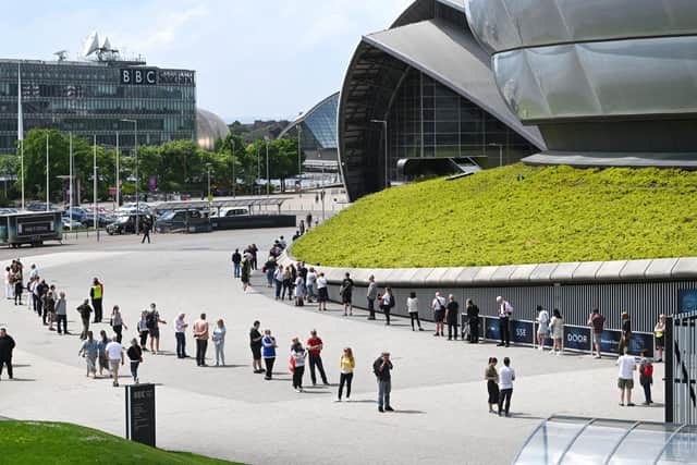 Queues outside the vaccination centre at Glasgow's Hydro. Picture: John Devlin