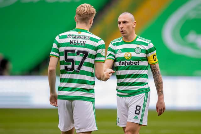 Stephen Welsh with Scott Brown, whom the young defender is desperate to see stay next season because of the help he gives "every single player" in the Celtic team. (Photo by Craig Williamson / SNS Group)