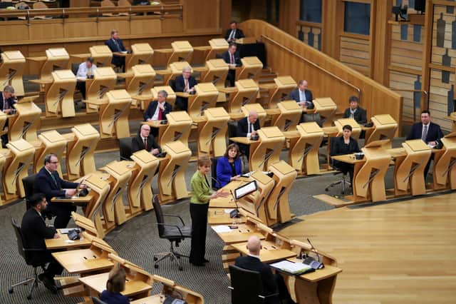 Nicola Sturgeon should be forced to apologise for on a regular basis for the neglect of people most in need of the Scottish government's power to improve their life prospects (Picture: Russell Cheyne/PA)