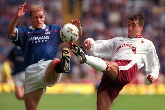 Ritchie tussling with Rangers' Gordon Durie in the 1998 final.