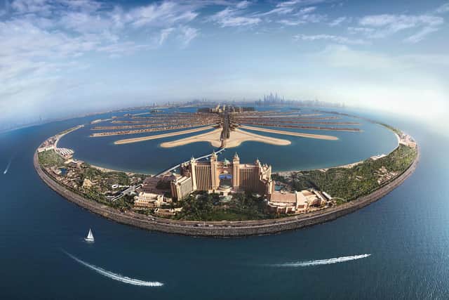 The Atlantis,  a salmon-pink Arabian archway at the tip of the crescent forming artificial archipelago Palm Jumeirah, has 1,539 guest rooms.