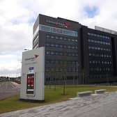 Napier University has halted compulsory redundancies after a union strike vote.