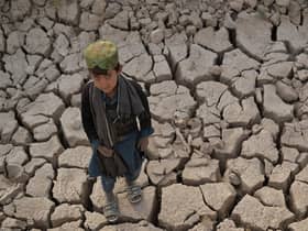 Droughts like this one in Bala Murghab, Afghanistan, in 2021 can force people to leave their homes (Picture: Hoshang Hashimi/AFP via Getty Images)