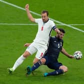 Scotland's Grant Hanley put the shackles on England's Harry Kane at Wembley.