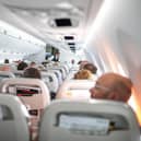 Walking down the aisle on flight helps avoid deep vein thrombosis. Pic: Alamy/PA.