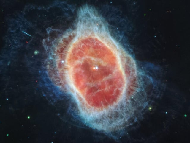 This image from the James Webb Space Telescope reveals the cloak of dust around the second star at the centre of the Southern Ring Nebula for the first time.