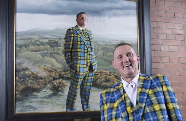 Doddie Weir stands in front of his portrait at the Scottish National Portrait Gallery (Picture: Neil Hanna)