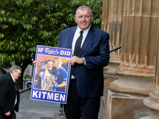 Local business man Andy Smillie displays a tribute to Rangers kit man Jimmy Bell at his funeral in Glasgow