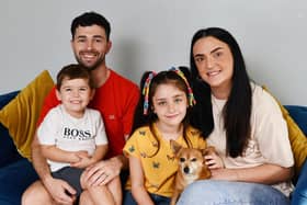 Rudi Bell, four, with dad Ross, mum Sam, sister Rosie, seven, and pet dog Luna. Pic: Michael Gillen