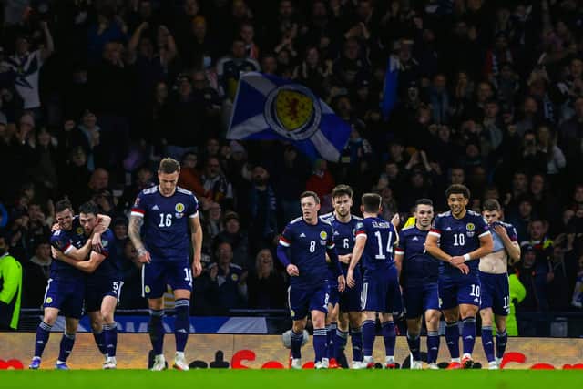 Scotland players celebrate John Souttar's opener in the 2-0 win over Denmark. (Photo by Craig Williamson / SNS Group)
