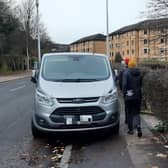 Pedestrians squeezing past a van parked on a pavement in Glasgow on Tuesday (Photo by The Scotsman)