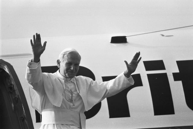 Pope John Paul II waves to the crowd before he boards his helicopter at Turnhouse (Edinburgh Airport) after the Papal visit to Scotland in May 1982.