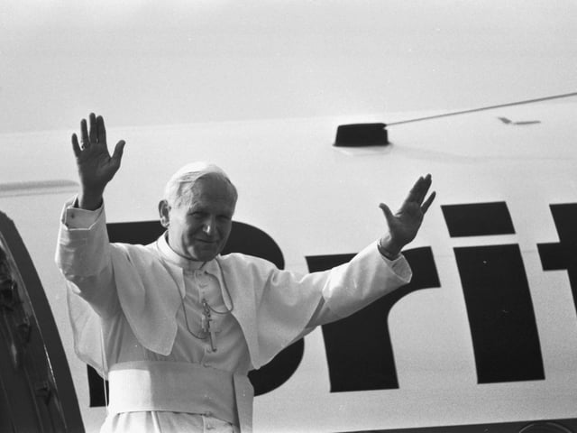 Pope John Paul II waves to the crowd before he boards his helicopter at Turnhouse (Edinburgh Airport) after the Papal visit to Scotland in May 1982.