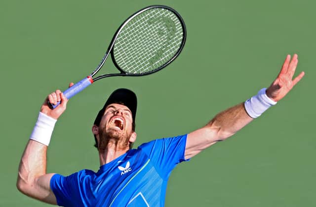 Andy Murray serves the ball during his defeat to Jannik Sinner at the Dubai Tennis Championship. (Photo by KARIM SAHIB/AFP via Getty Images)