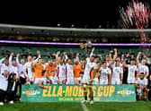 England's team celebrate their victory over Australia in Sydney.