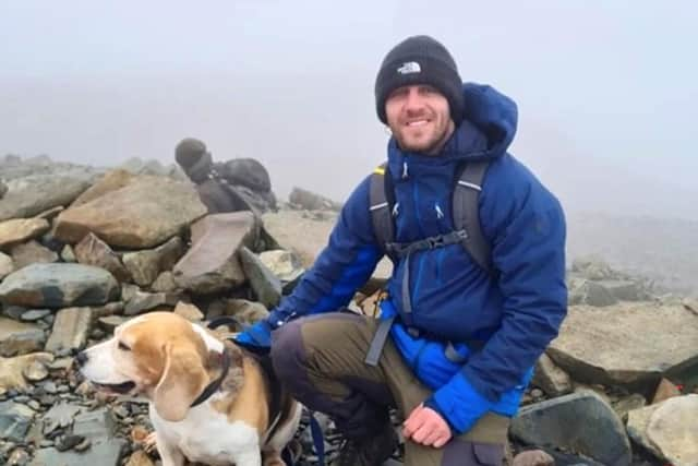 Kyle Sambrook, 33, with his beagle called Bane. Picture: Police Scotland/PA Wire