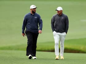 Jon Rahm and Brooks Koepka walk up the 13th fairway during the continuation of the weather-delayed third round of the 2023 Masters at Augusta National Golf Club. Picture: Andrew Redington/Getty Images.
