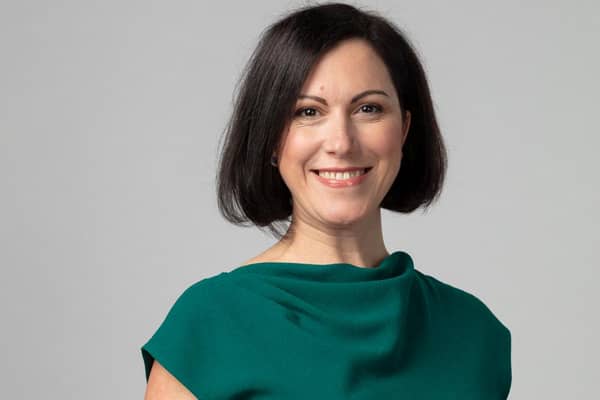 Claudia Cavalluzzo, Director Converge
