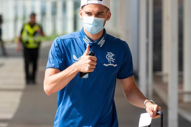 Rangers attacking midfielder Ianis Hagi in upbeat mood as he departs Glasgow Airport for the Europa League play-off round decider against Armenian champions Alashkert. (Photo by Mark Scates / SNS Group)