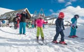 Family skiing at The Lecht ski centre in the Cairngorms 