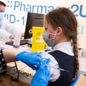 A 11-year-old receives the Pfizer BioNTech vaccine. Picture: Jeff Spicer/PA Wire