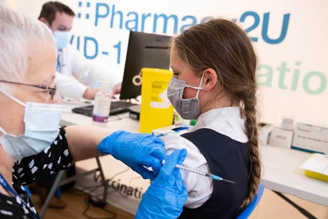 A 11-year-old receives the Pfizer BioNTech vaccine. Picture: Jeff Spicer/PA Wire