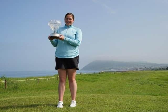 Milngavie's Lorna McClymont kept her hands on the Flogas Irish Women's Amateur Open trophy after making a successful title defence at Woodbrook in County Wicklow. Picture: Golf Ireland.