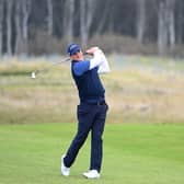 Marc Warren plays his second shot on the 16th hole during the final round of the Aberdeen Standard Investments Scottish Open at The Renaissance Club. Picture: Ross Kinnaird/Getty Images