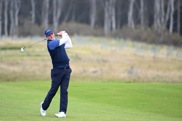 Marc Warren plays his second shot on the 16th hole during the final round of the Aberdeen Standard Investments Scottish Open at The Renaissance Club. Picture: Ross Kinnaird/Getty Images