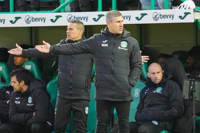 Hibs manager Nick Montgomery, centre, has lost the support from some Hibs fans.