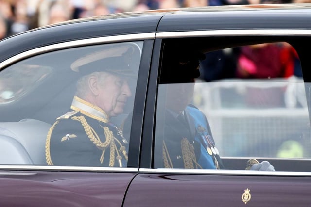 LONDON, ENGLAND - SEPTEMBER 19: King Charles III and Prince William, Prince of Wales are seen on The Mall ahead of The State Funeral of Queen Elizabeth II on September 19, 2022 in London, England. Elizabeth Alexandra Mary Windsor was born in Bruton Street, Mayfair, London on 21 April 1926. She married Prince Philip in 1947 and ascended the throne of the United Kingdom and Commonwealth on 6 February 1952 after the death of her Father, King George VI. Queen Elizabeth II died at Balmoral Castle in Scotland on September 8, 2022, and is succeeded by her eldest son, King Charles III. (Photo by Chris J Ratcliffe/Getty Images)