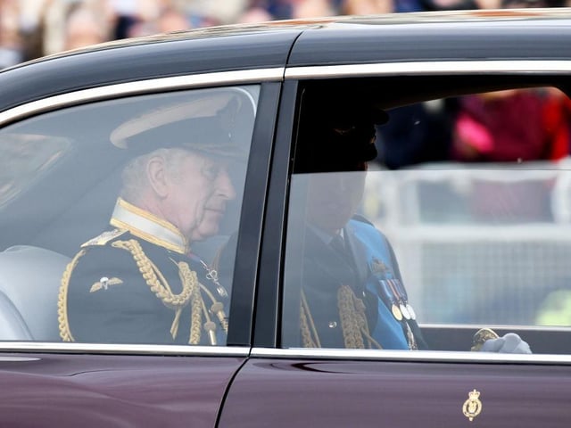 LONDON, ENGLAND - SEPTEMBER 19: King Charles III and Prince William, Prince of Wales are seen on The Mall ahead of The State Funeral of Queen Elizabeth II on September 19, 2022 in London, England. Elizabeth Alexandra Mary Windsor was born in Bruton Street, Mayfair, London on 21 April 1926. She married Prince Philip in 1947 and ascended the throne of the United Kingdom and Commonwealth on 6 February 1952 after the death of her Father, King George VI. Queen Elizabeth II died at Balmoral Castle in Scotland on September 8, 2022, and is succeeded by her eldest son, King Charles III. (Photo by Chris J Ratcliffe/Getty Images)