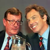 British Prime Minister Tony Blair (right), and Northern Ireland First Minister David Trimble on the platform during the Labour Party Conference at Blackpool in 1998. Picture: Press Association