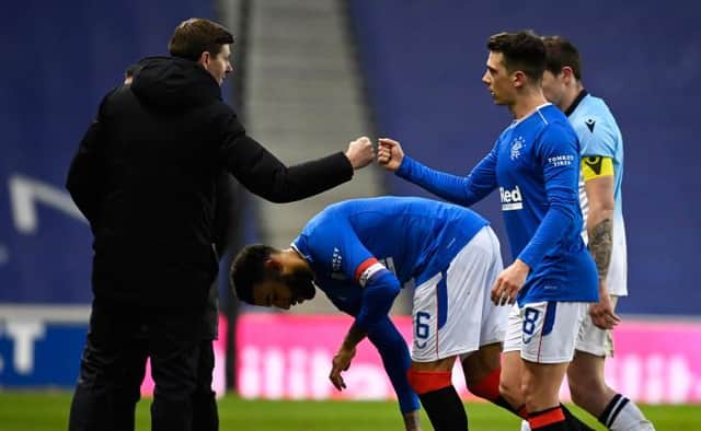 Rangers manager Steven Gerrard congratulates Ryan Jack after the midfielder made a scoring return to action in the 5-0 win over Ross County at Ibrox. (Photo by Rob Casey / SNS Group)