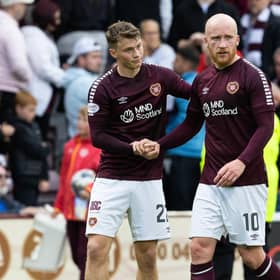 Hearts' Aidan Denholm and Liam Boyce at full time following the 0-0 draw with Kilmarnock at Tynecastle.