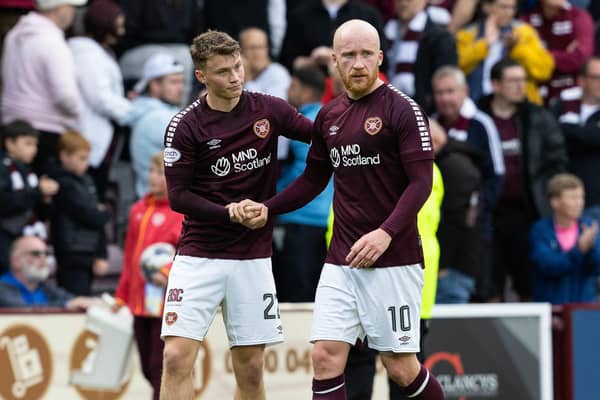 Hearts' Aidan Denholm and Liam Boyce at full time following the 0-0 draw with Kilmarnock at Tynecastle.